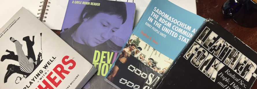 Photograph of books on a table.
